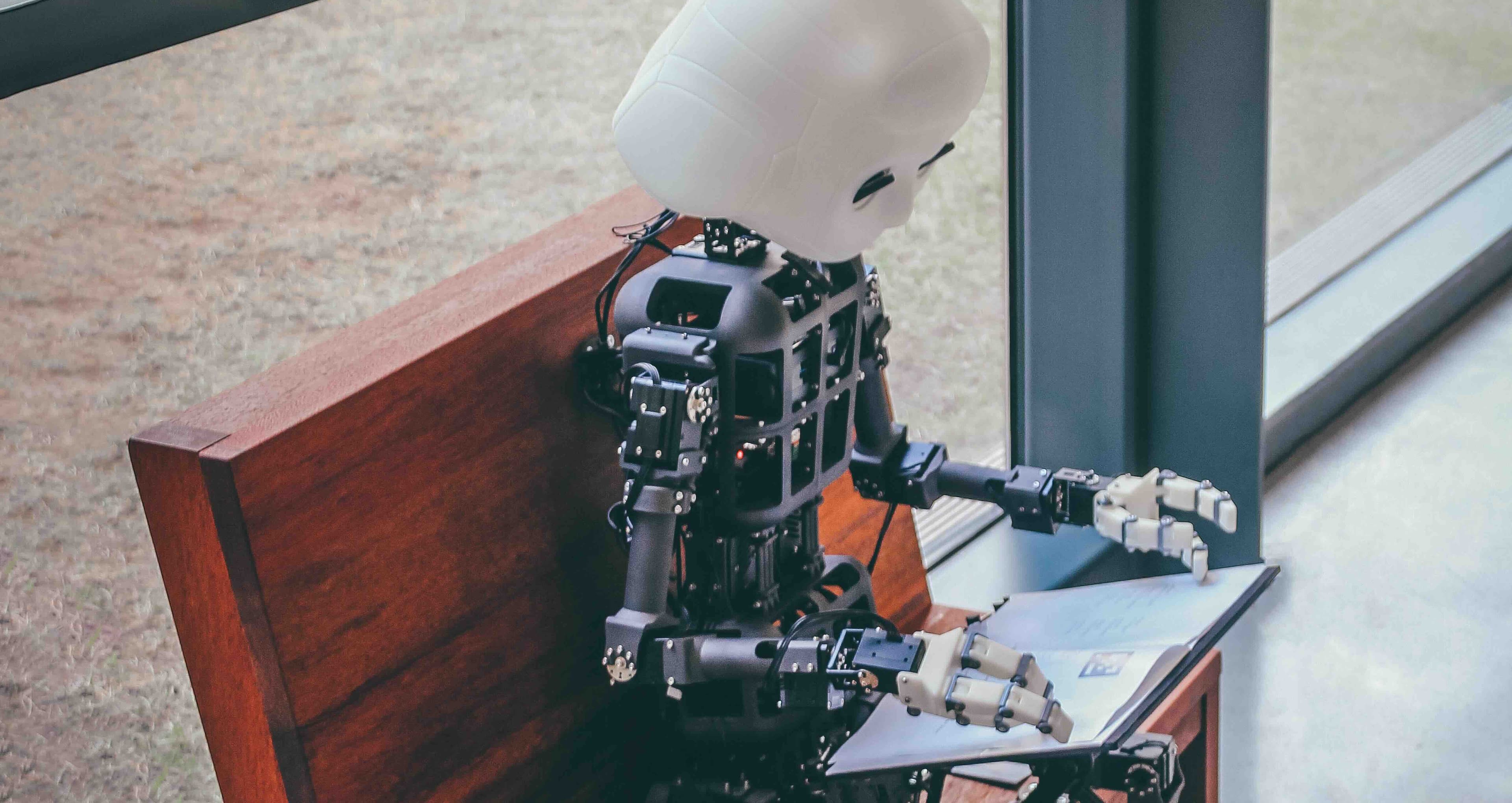 Robot AI reviewing personal finances