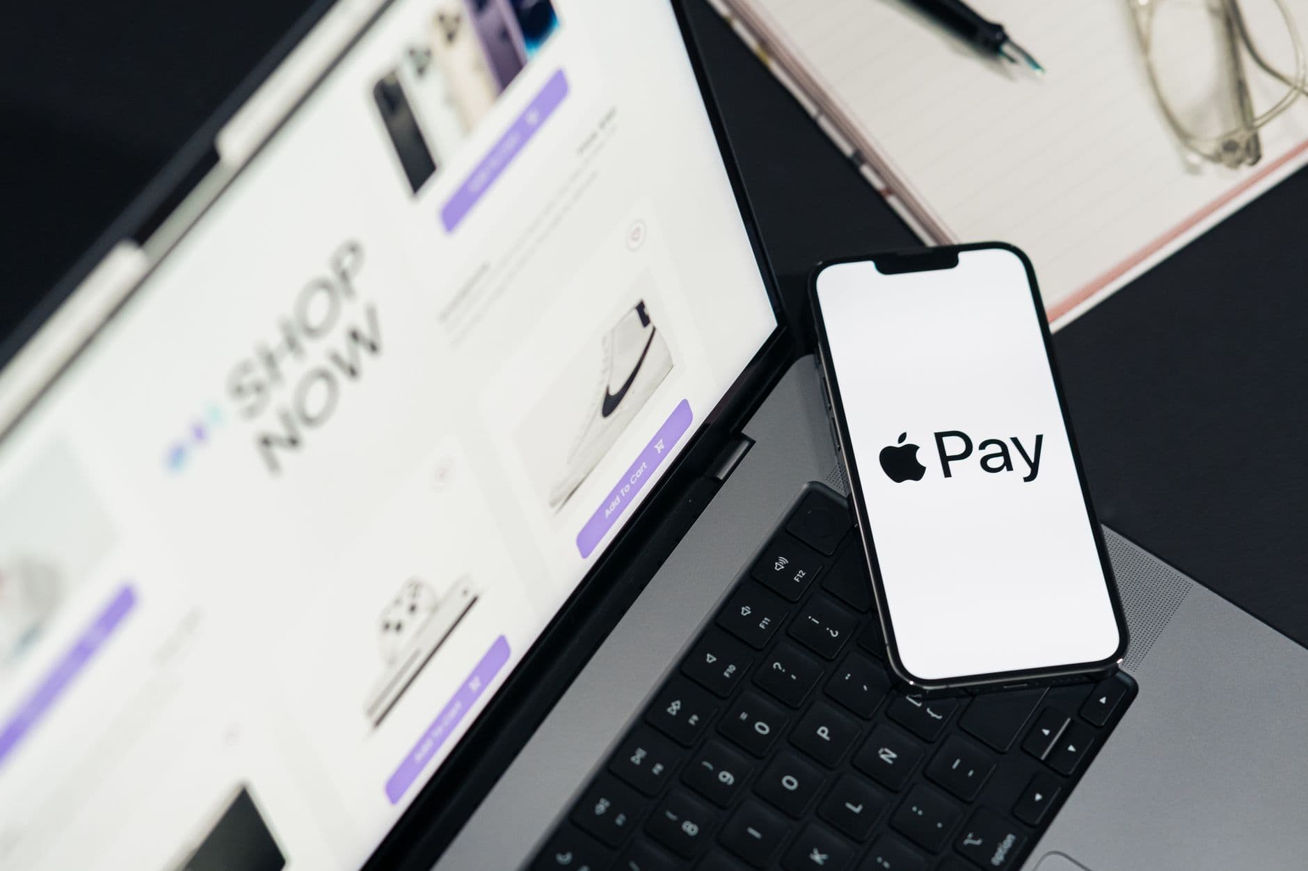 Person using a smartphone to complete a buy now pay later transaction at checkout