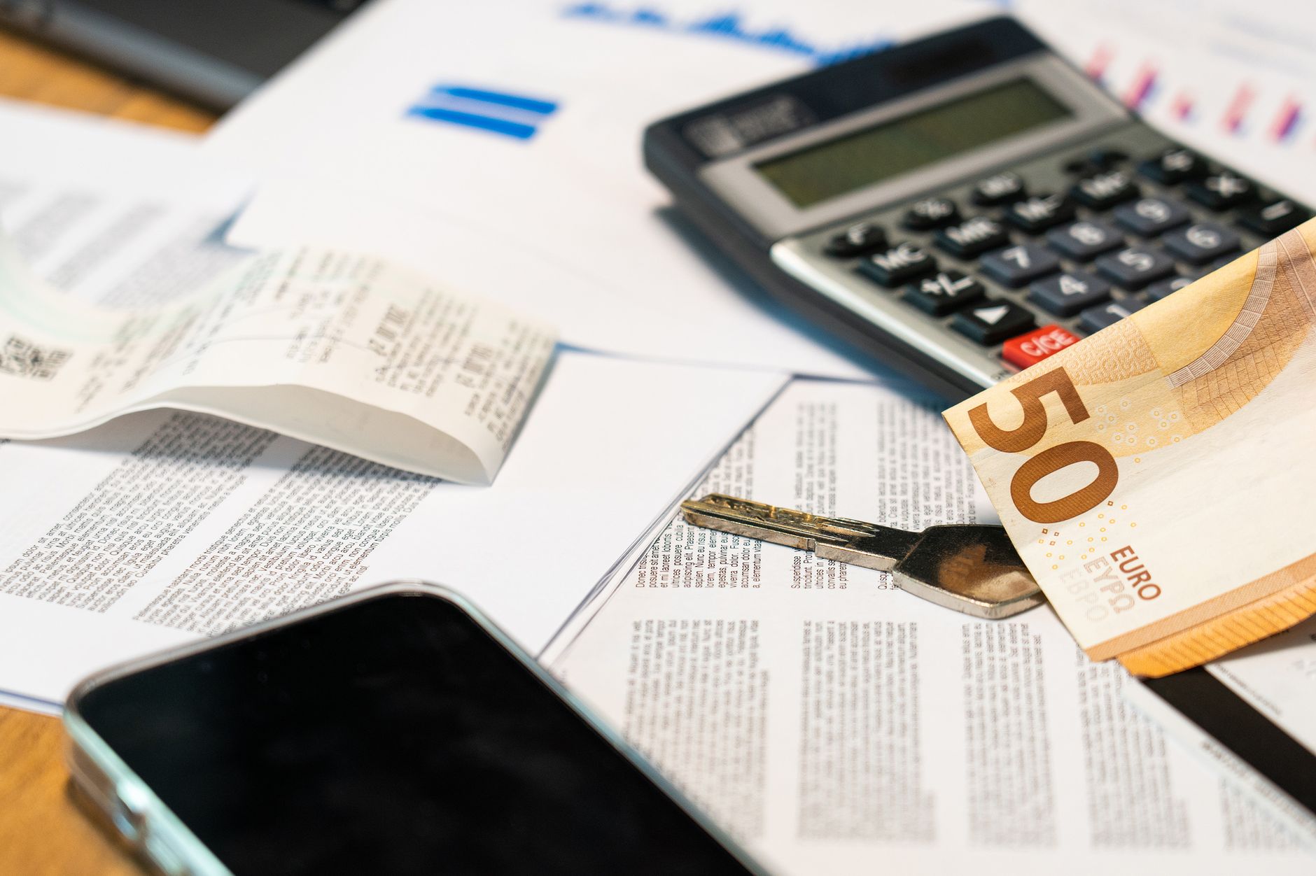 Person reviewing AI-powered budgeting app on a smartphone