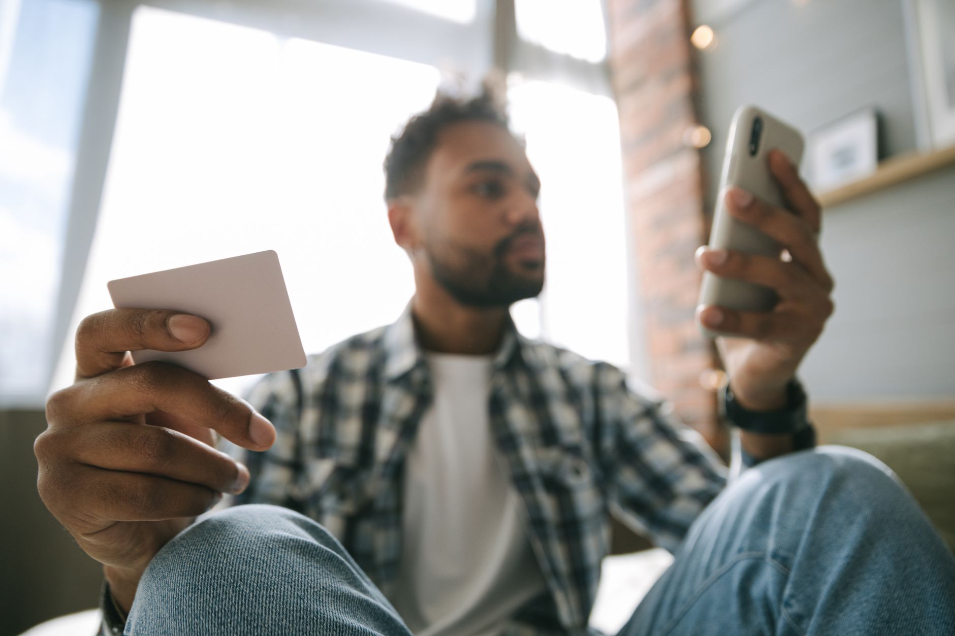 Person using an AI financial advice chatbot on a smartphone